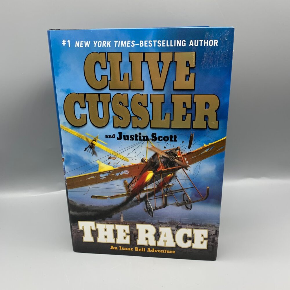 The Race (An Isaac Bell Adventure) Hardcover Novel by Clive Cusslor